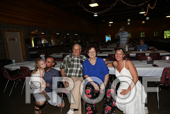 8L2A2248 Wedding - The bride and groom with family