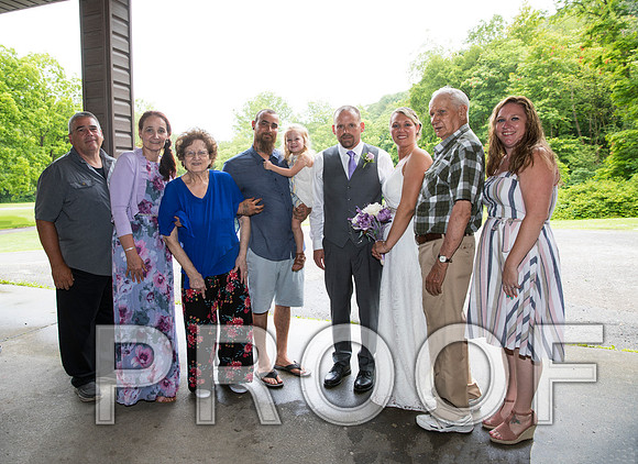 8L2A2165 aaa Wedding - The bride and groom with family
